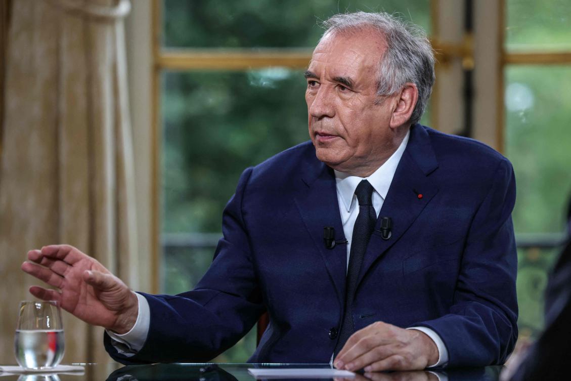 France’s Prime Minister Francois Bayrou speaks with journalists during a live televised interview broadcast with news channels LCI, CNews, BFMTV, and FranceInfo TV, at the Hotel de Matignon in Paris, on August 31, 2025. (AFP)