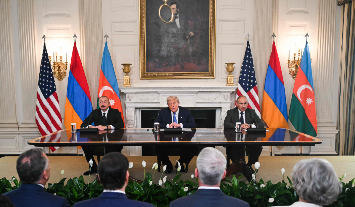 President Trump participates in a trilateral signing with Azerbaijan and Armenia officials in Washington. (AFP)