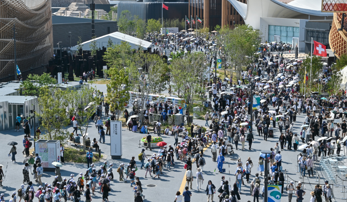 This general view shows people walking around various pavilions as they visit the 2025 Osaka Expo in Osaka on May 14, 2025. (AFP