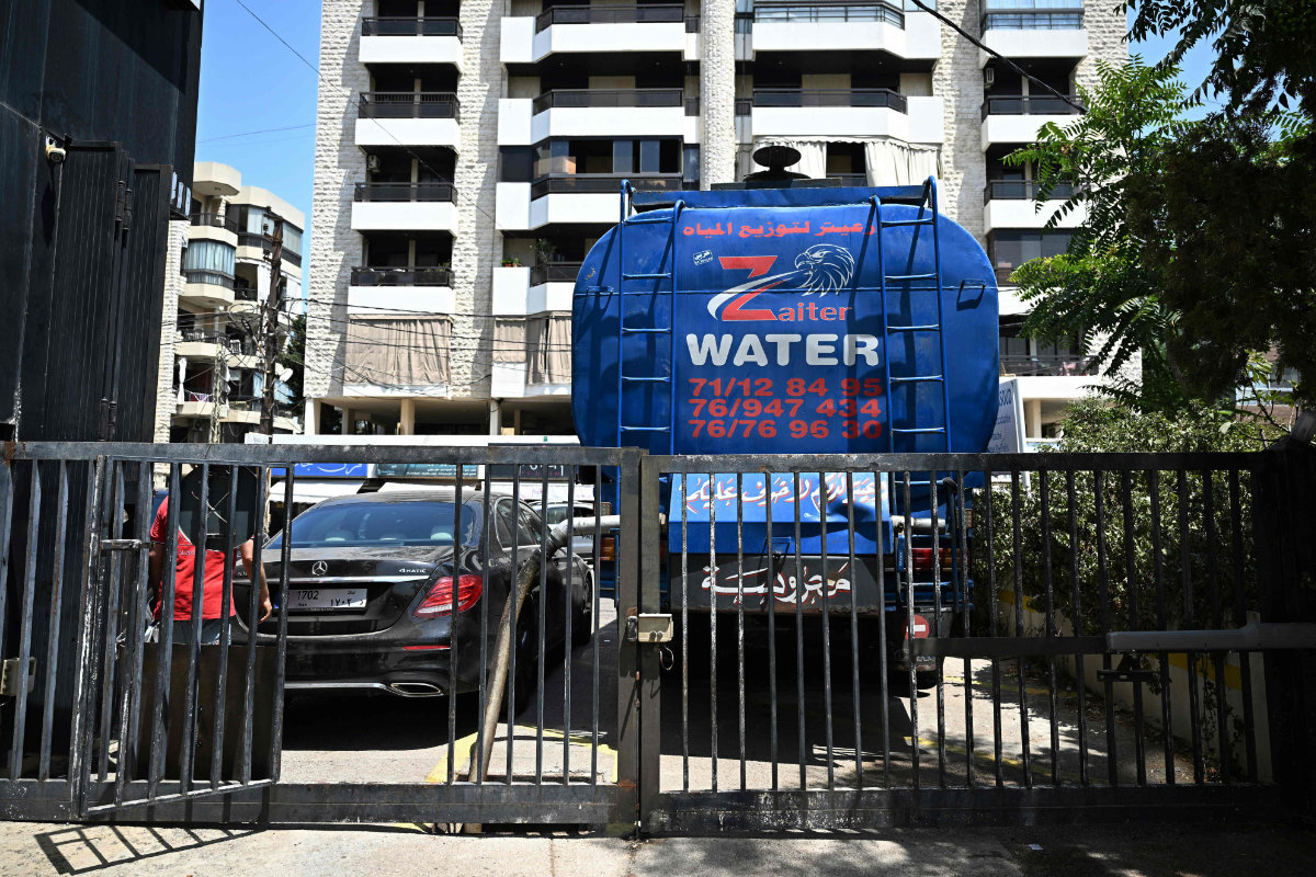 People are buying water by the truckload in Beirut amid the worst water shortage in years due to record-low rainfall. (AFP)