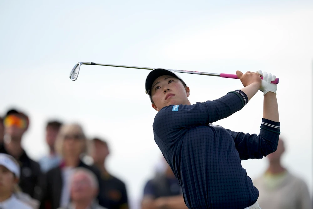 Tournament co-leader Rio Takeda of Japan during the first round of the Women’s British Open golf championship, at Royal Porthcawl Golf Club in Porthcawl, Wales, Thursday. (AP)
