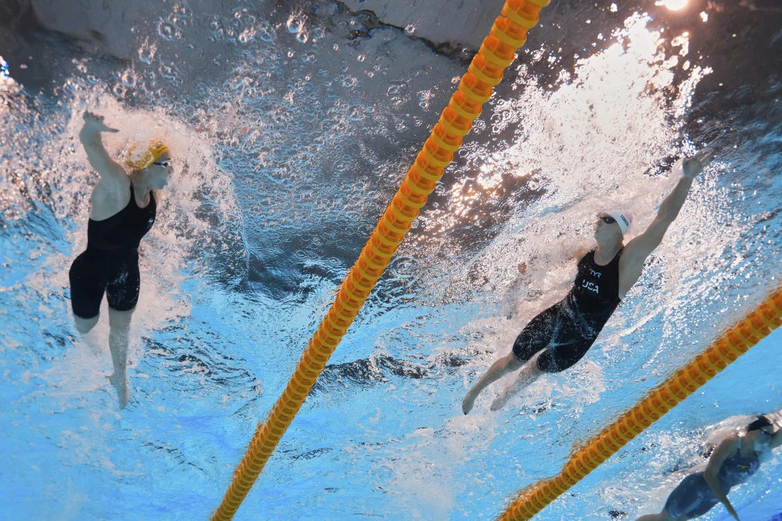 United States great Katie Ledecky beat Summer McIntosh to win a thrilling 800m freestyle world title in Singapore on Saturday. (AP)