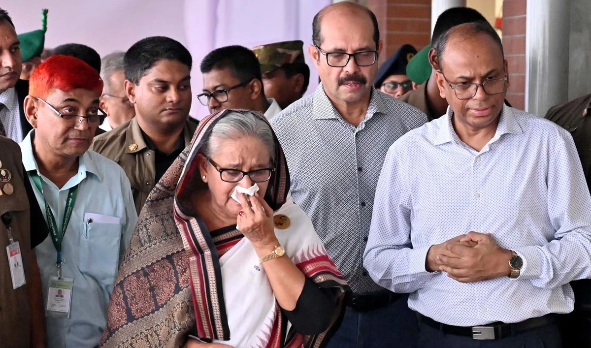 Former Prime Minister Sheikh Hasina weeps while she visits a metro station, vandalized by students during the anti-quota protests, in Mirpur, Bangladesh, on 25 July 2024. (Bangladesh Prime Minister’s Office/File)