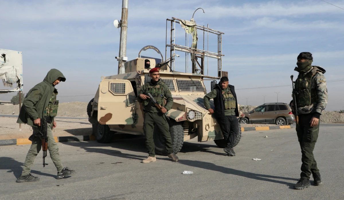 Members of Kurdish-led Syrian Democratic Forces (SDF) stand along a street, after rebels seized the capital and ousted Syria's Bashar al-Assad, in Hasakah, Syria December 11, 2024. (REUTERS)