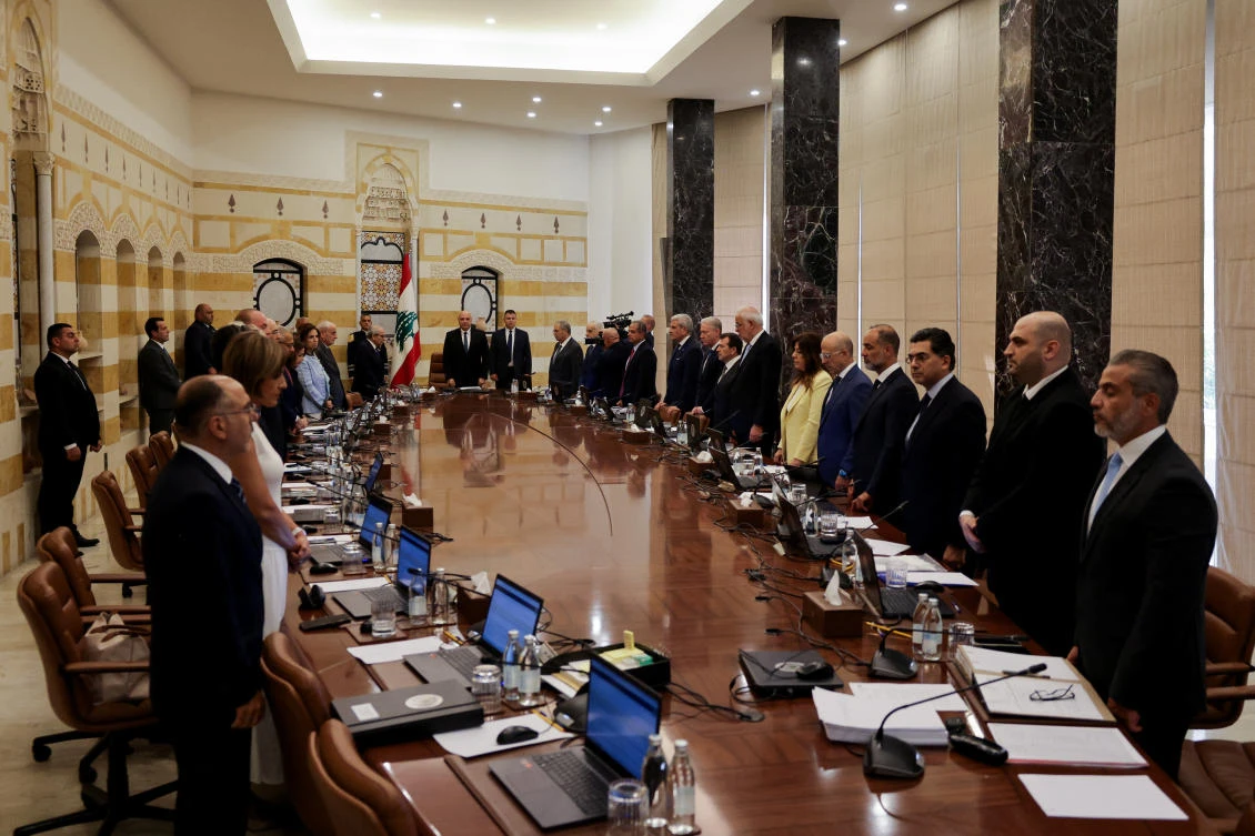 Lebanese President Joseph Aoun, PM Nawaf Salam and cabinet members stand for a minute of silence to remember the fifth anniversary of the Beirut port explosion, during a meeting to discuss efforts to bring all weapons in the country under the control of the state, at the Presidential Palace in Baabda, Aug. 5, 2025. (Reuters)