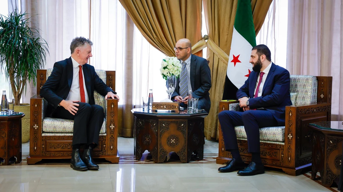 Ahmad Al-Sharaa, the interim president of Syria , and the UK National Security Adviser Jonathan Powell. (SANA)