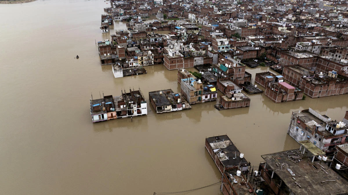 A flooded area on the banks of the river Ganges following heavy monsoon rains in Prayagraj, India, Monday, Aug. 4, 2025. (AP)