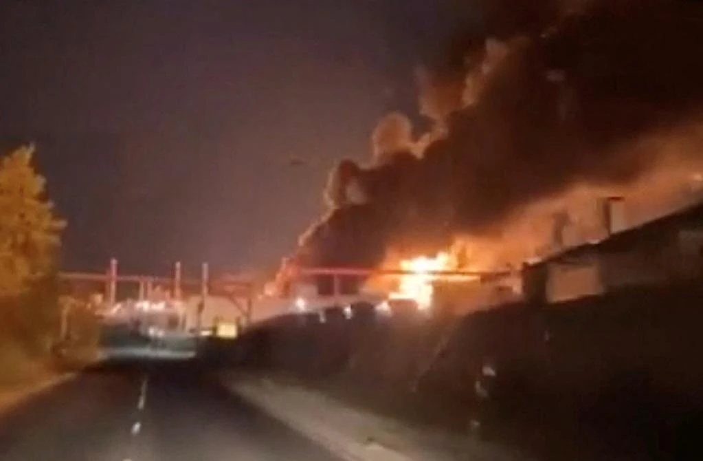 Smoke and fire rise from an industrial facility, which, according to the governor of the southern Russian region, was damaged in a Ukrainian drone attack in this sreengrab obtained from social media video released on Aug. 10, 2025. (Social Media via Reuters)