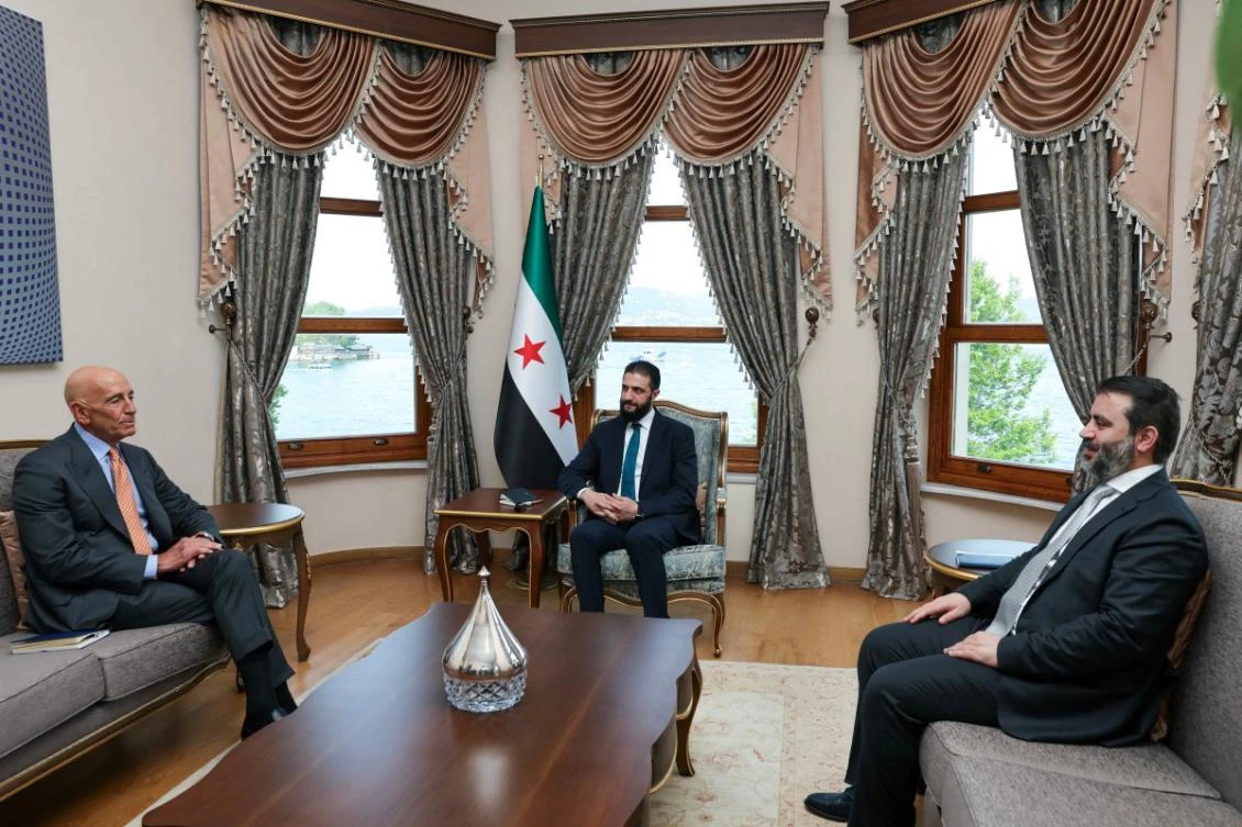 US Special Envoy for Syria Thomas Barrack (L) during a meeting with Syrian President Ahmed Al-Sharaa (C) Syria’s Minister of Foreign Affairs Asaad Hassan Al-Shaibani. (File/AFP)