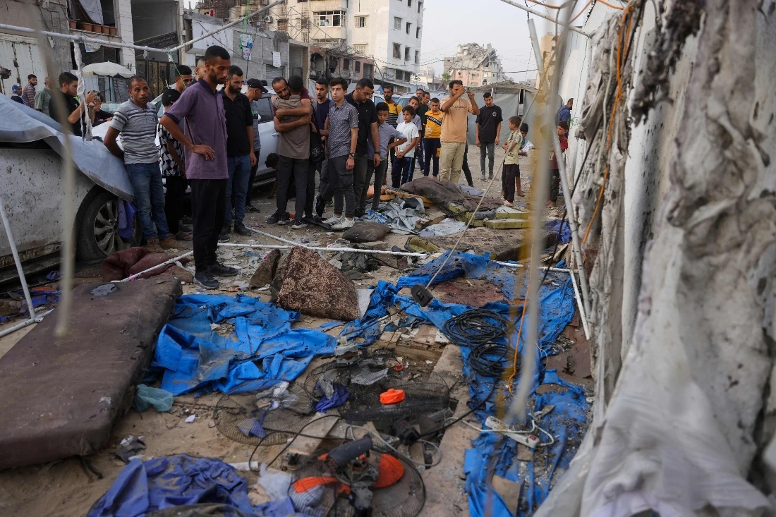 Palestinians check the destroyed Al Jazeera tent at Al-Shifa Hospital in Gaza City. (AFP)