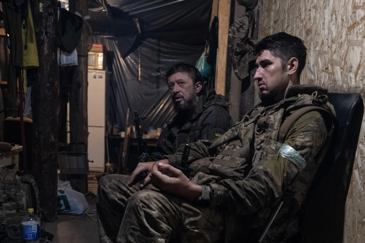 Ukrainian soldiers resting in a shelter after returning from frontline positions after months of fighting, at an undisclosed location in Donetsk region, Aug. 5, 2025. (AFP)