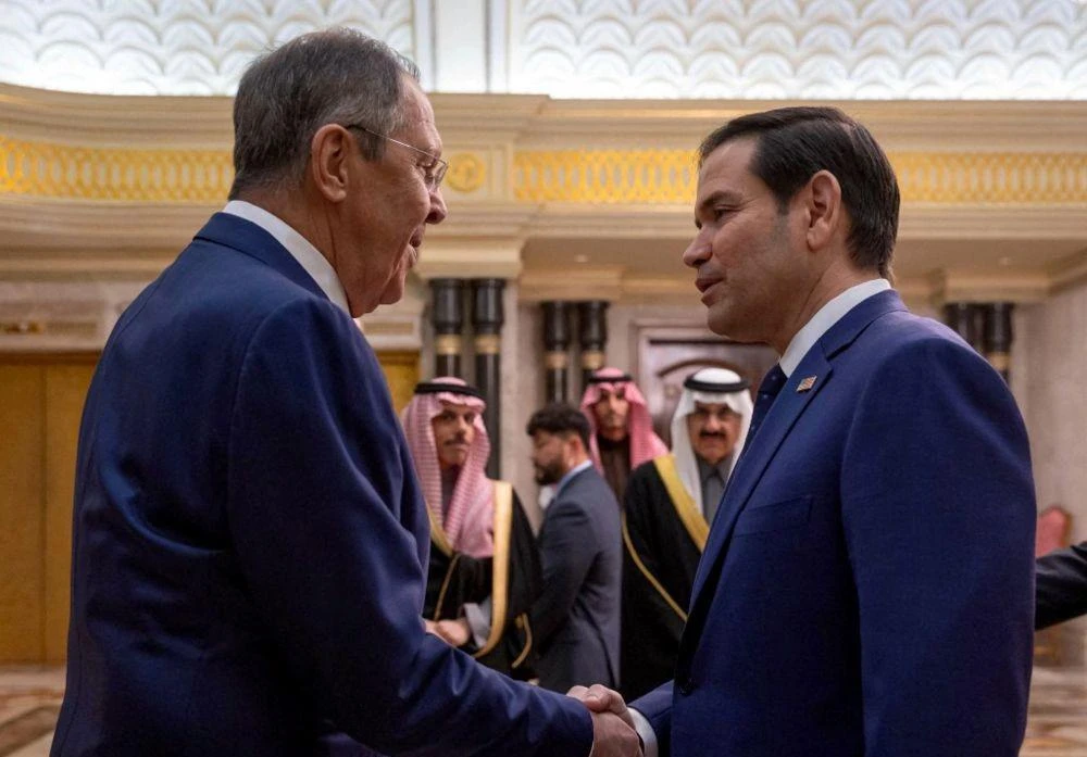 US Secretary of State Marco Rubio shakes hands with Russian FM Sergei Lavrov during their meeting in Diriyah Palace, Riyadh, Saudi Arabia, Feb. 18, 2025. (AFP)