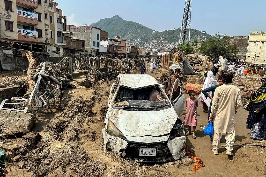 Pakistan expands rescue and relief efforts after floods kill over 200 in a single district