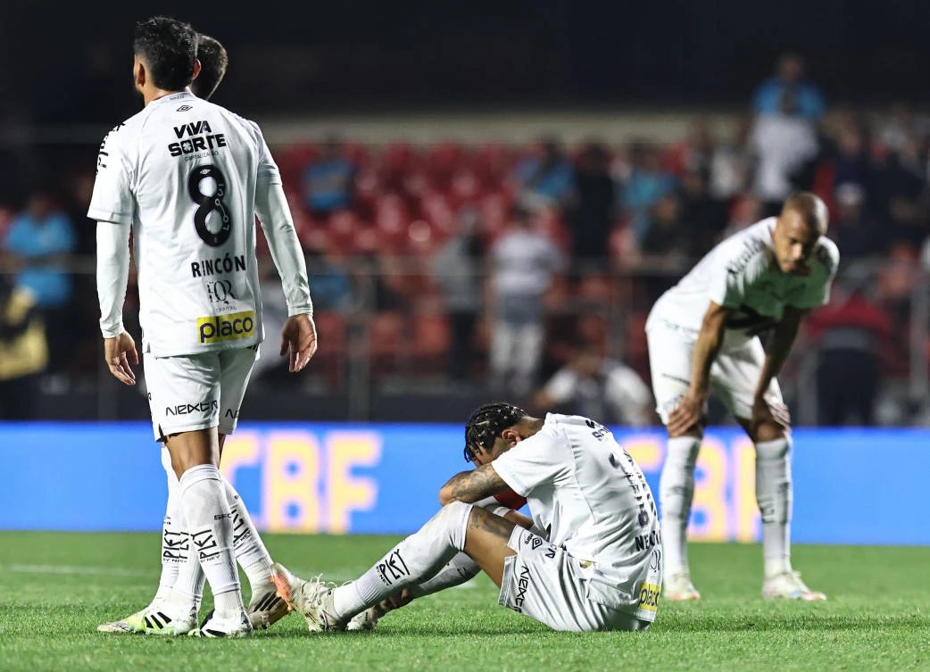 Neymar sits dejected after his Santos team suffered a 6-0 home loss Sunday to Vasco Da Gama. (Reuters)