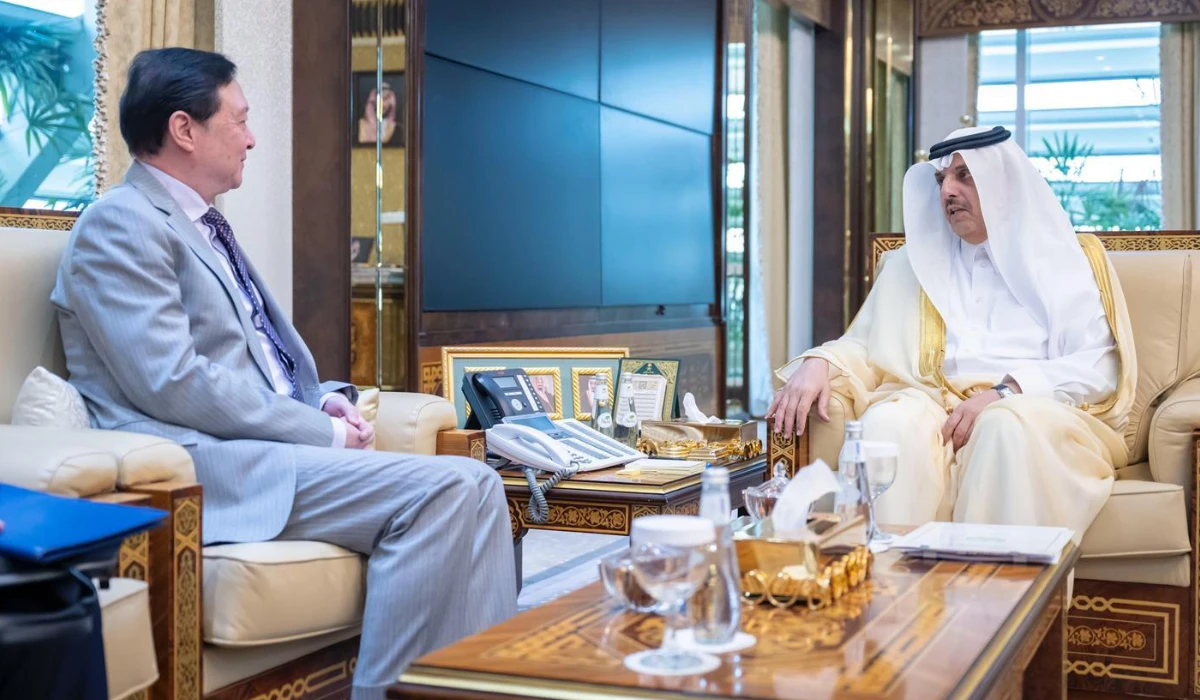 Prince Abdulaziz bin Mohammed bin Ayyaf (R) holds talks with Chang Hua in Riyadh. (Supplied)