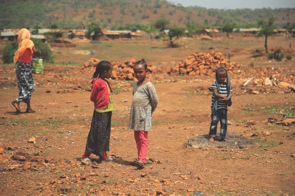 Children stand outside Adi Harush Eritrean refugee camp in the Mai Tsberi town in Tigray, Ethiopia. (File/Reuters)