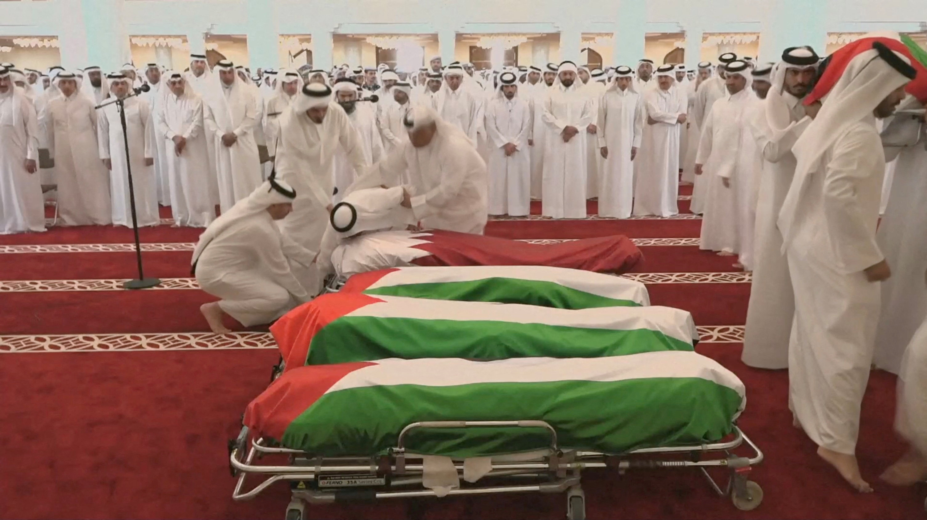 People attend a funeral held for those killed by an Israeli attack in Doha. (Reuters/Qatar TV)