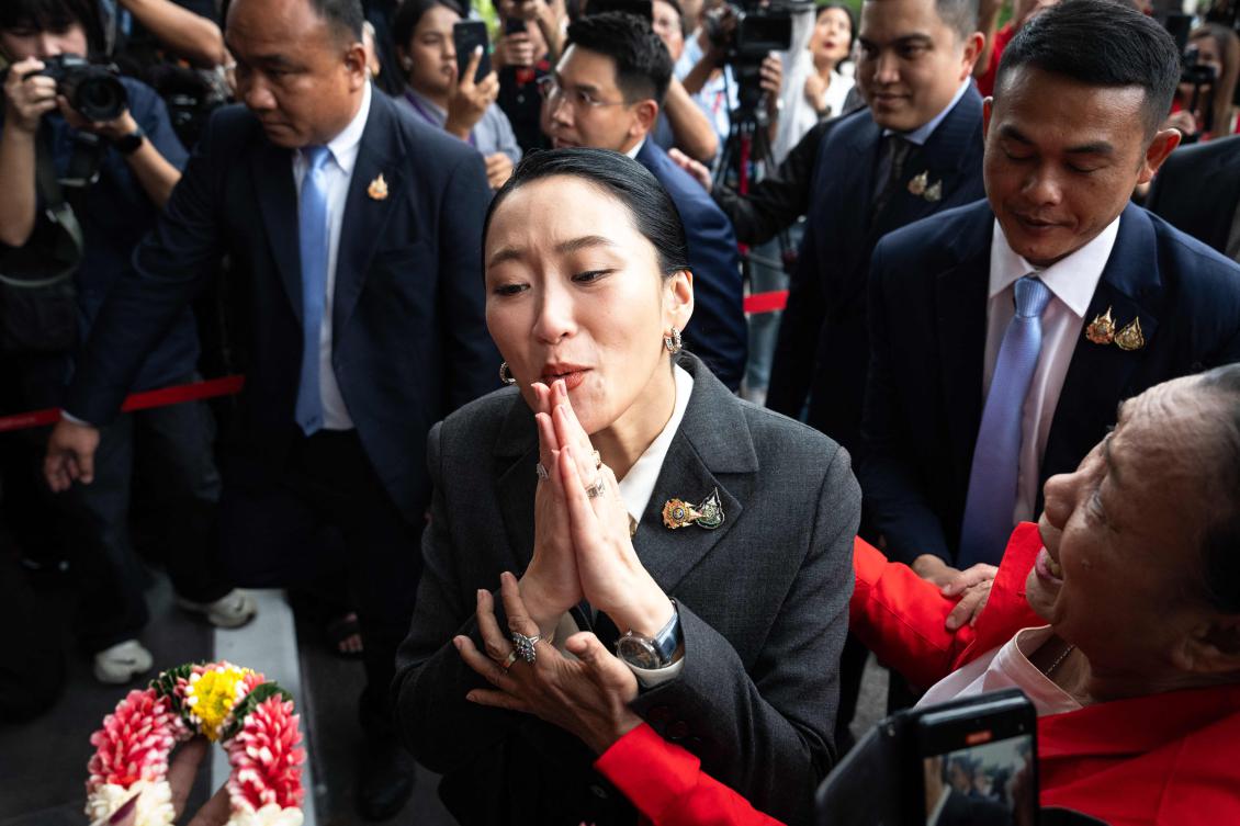 Thailand’s prime minister Paetongtarn Shinawatra, center, and her cabinet were sacked on Aug. 29, 2025 over her handling of the country’s border row with Cambodia. (AFP)