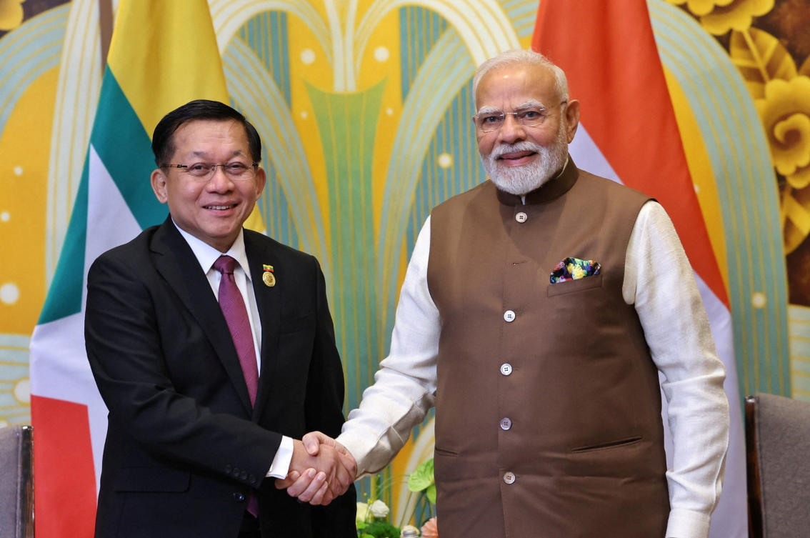 India’s Prime Minister Narendra Modi shakes hands with Myanmar’s military chief Min Aung Hlaing during a meeting on the sidelines of Shanghai Cooperation Organization Summit in Tianjin, China on Aug. 31, 2025. (India’s Press Information Bureau via Reuters)