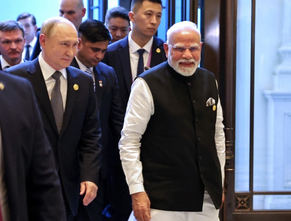 Russia’s President Vladimir Putin and Indian Prime Minister Narendra Modi hold a meeting on the sidelines of the Shanghai Cooperation Organization summit in Tianjin on Sept. 1, 2025. (AFP)