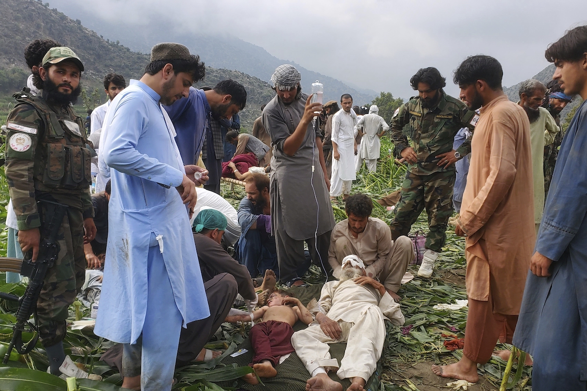 Civil defense workers, locals, and army soldiers prepare to evacuate injured victims of an earthquake that killed hundreds in eastern Afghanistan, in Mazar Dara, Kunar province, Monday, Sept. 1, 2025. (AP)