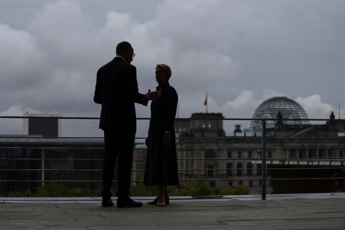 Swiss President Karin Keller-Sutter and German Chancellor Friedrich Merz speak as they meet at the Chancellery in Berlin, Germany. (Reuters)
