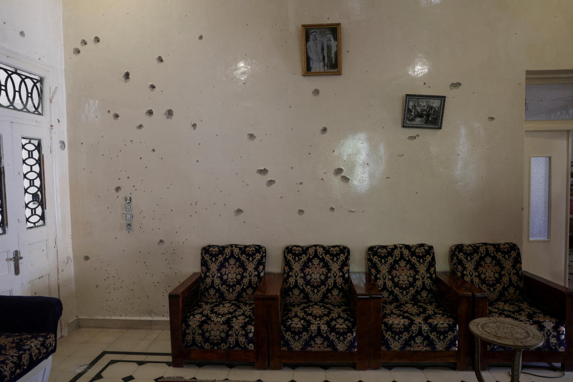 A wall is pockmarked by bullet holes inside the Saraya family house, following sectarian violence in Syria's Sweida province, where government forces were sent to quell local clashes between Druze armed factions and Bedouin tribal fighters, in the predominantly Druze city of Sweida, Syria, July 25, 2025. (REUTERS)