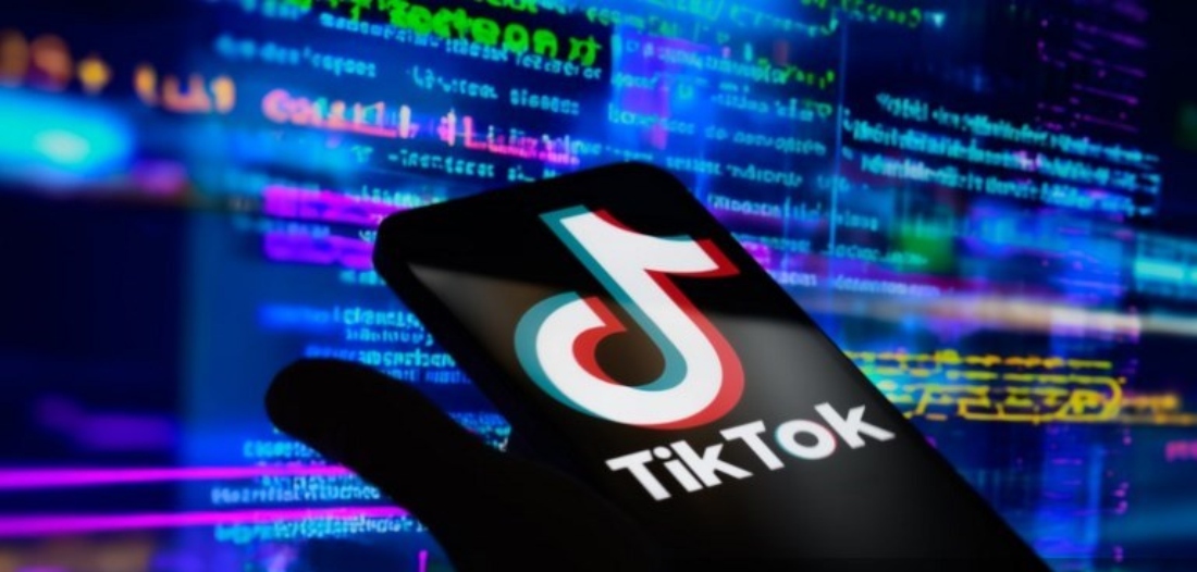 The TikTok logo is displayed on a mobile phone. (AFP)