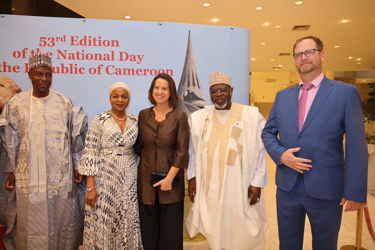 Cameroon’s Ambassador to Saudi Arabia Iya Tidjani poses with guests at the National Day reception. (Supplied)