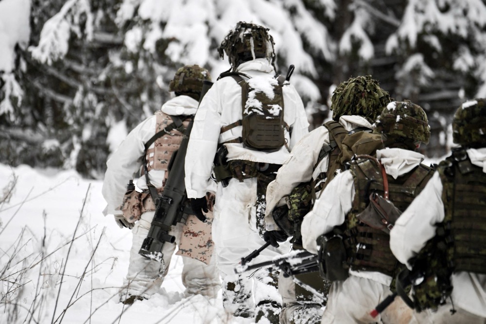 Estonian soldiers take part in a major drill as part of the EFP NATO operation at the Tapa estonian army camp near Rakvere, on February 6, 2022. (AFP/File)