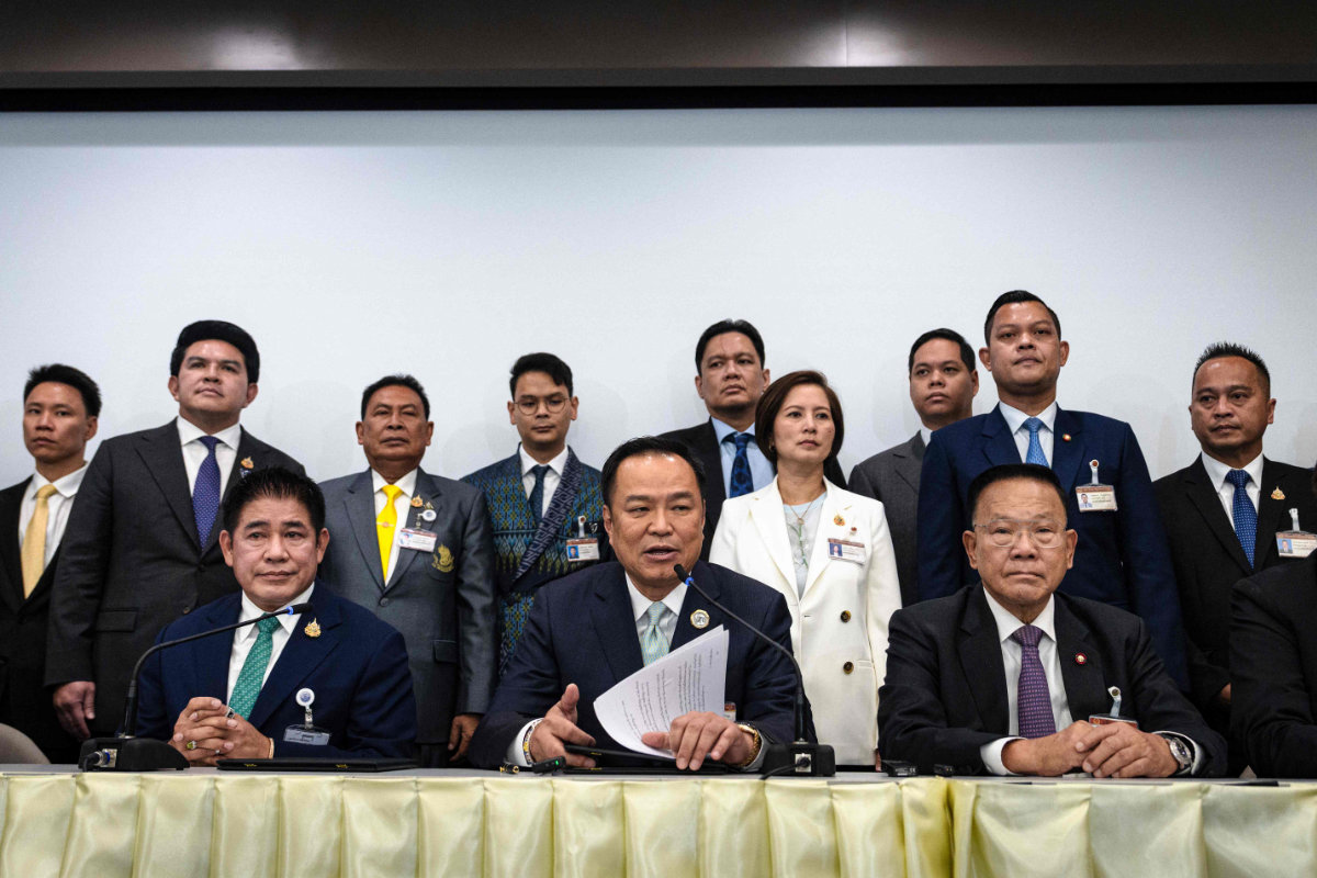 Bhumjaithai Party leader Anutin Charnvirakul (C) attends a press conference after securing the backing of opposition People's Party to serve as Thailand's next prime minister at the parliament in Bangkok on September 3, 2025. (AFP)