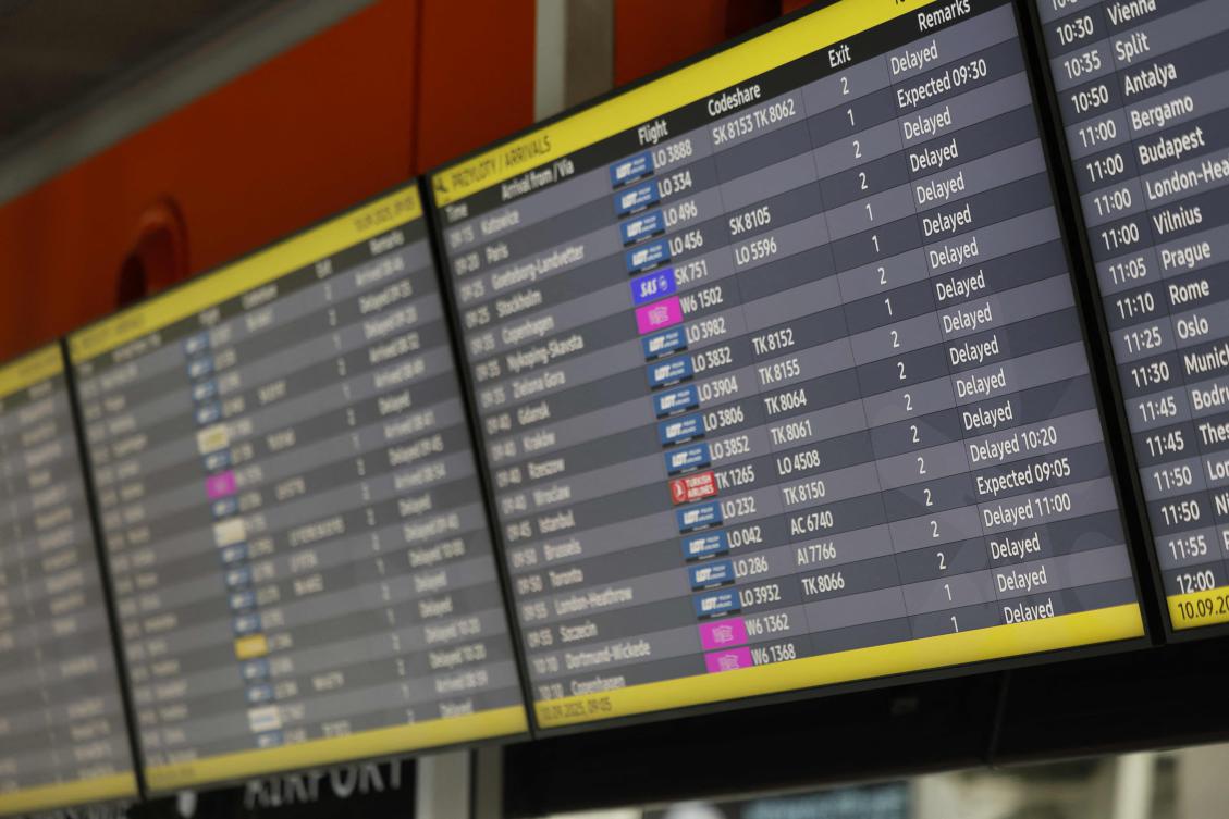 Delayed flights are seen on monitors at the international airport in Warsaw, on September 10, 2025, after the airport was closed due to Russian drones violated Polish airspace on Wednesday morning. (AFP)