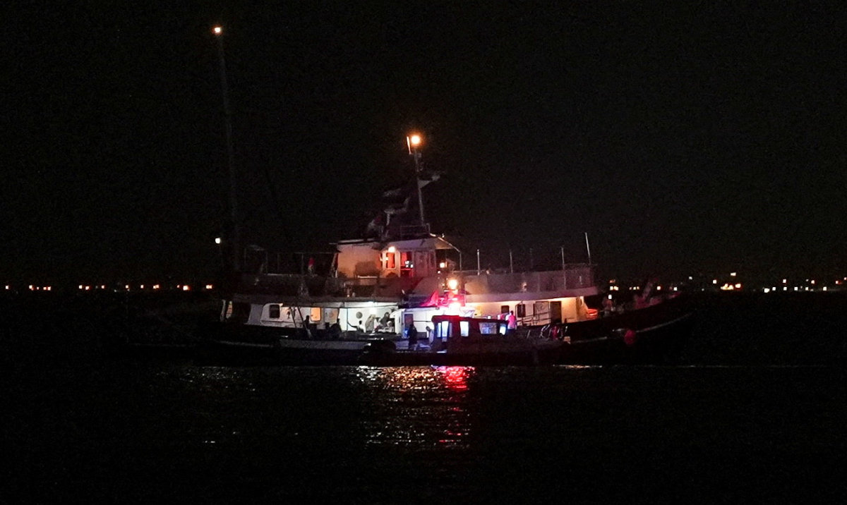 A Global Sumud flotilla vessel floats in the waters as Tunisian Maritime National Guard boats conduct an inspection in Sidi Bou Said, Tunisia, September 9, 2025. (Reuters)
