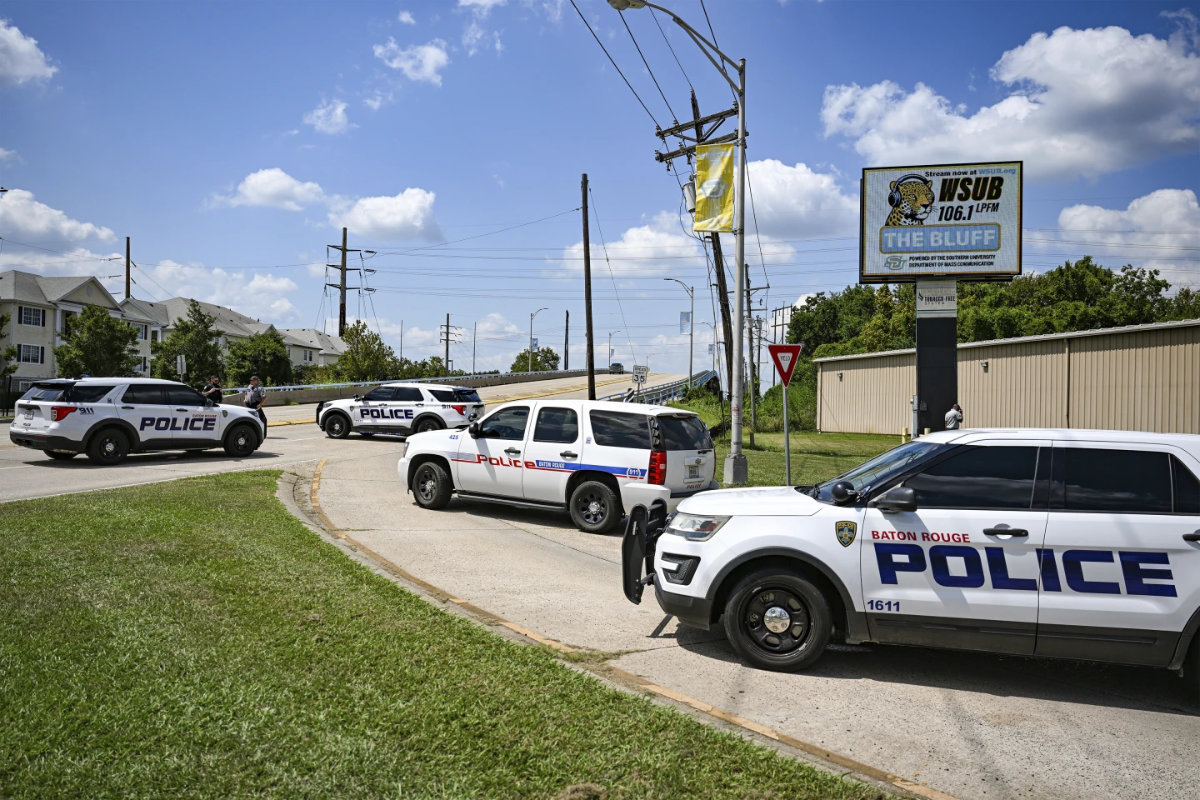 Baton Rouge Police block the entrance of Southern University's campus at the corner of Harding Boulevard and Scenic Highway on Sept. 11, 2025, in Baton Rouge, Louisiana, after a threat led administers to announce a lockdown. (Javier Gallegos/The Advocate via AP)