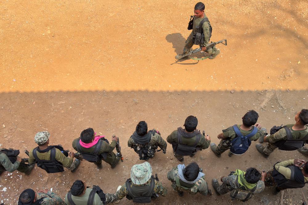District Reserve Guard personnel take part in a simulation exercise at their base in Dantewada, in Bastar division of India’s Chhattisgarh state. India is waging an all-out offensive against the last vestiges of its Naxalite rebellion. (AFP file photo)