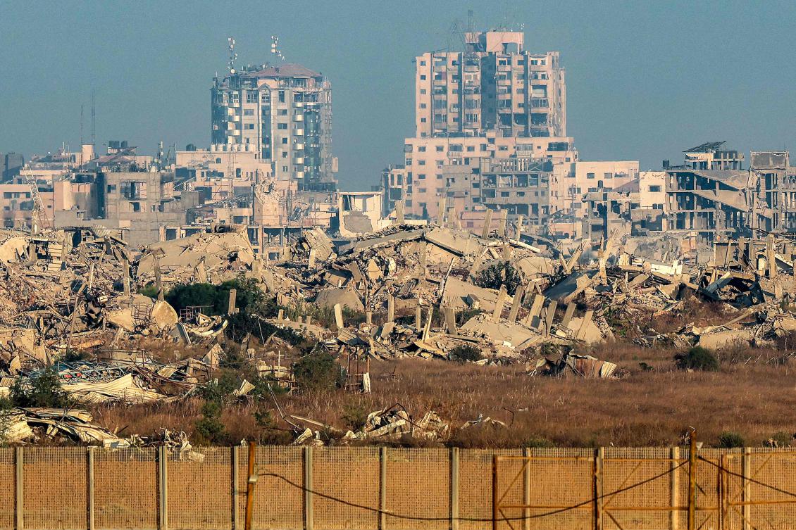 Above, destroyed buildings are pictured in the Gaza Strip from across the border fence in southern Israel on Sept. 12, 2025. (AFP)