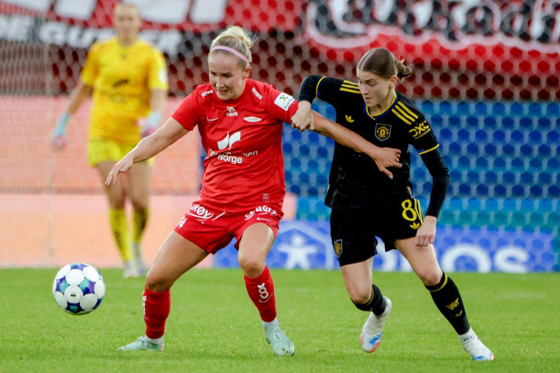 Brann’s defender Nea Lehtola and Manchester United’s forward Jess Park vie for the ball during their UEFA Champions League qualifying match at Brann Stadium, in Bergen, Norway on Sept. 11, 2025. (AFP)