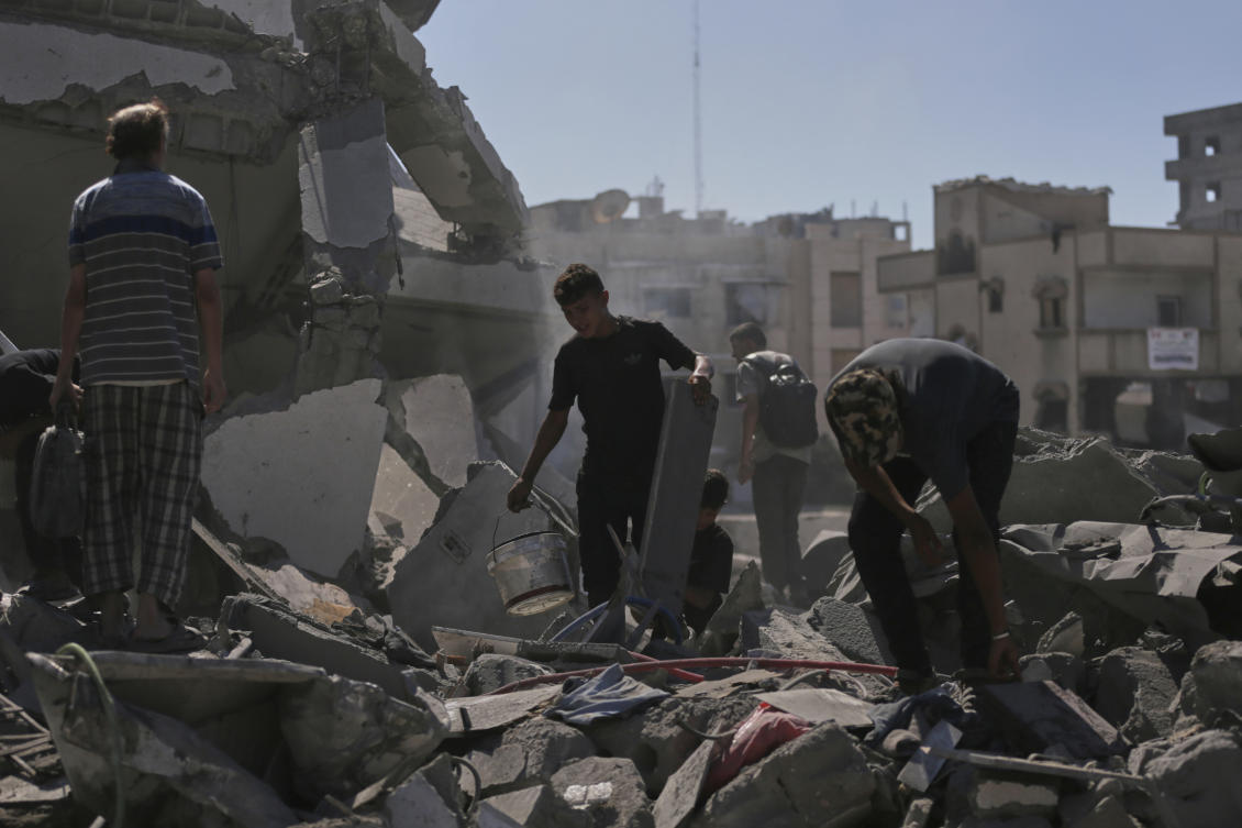Palestinians inspect the rubble of a building after an Israeli military strike in Gaza City, Sept. 12, 2025. (AP)