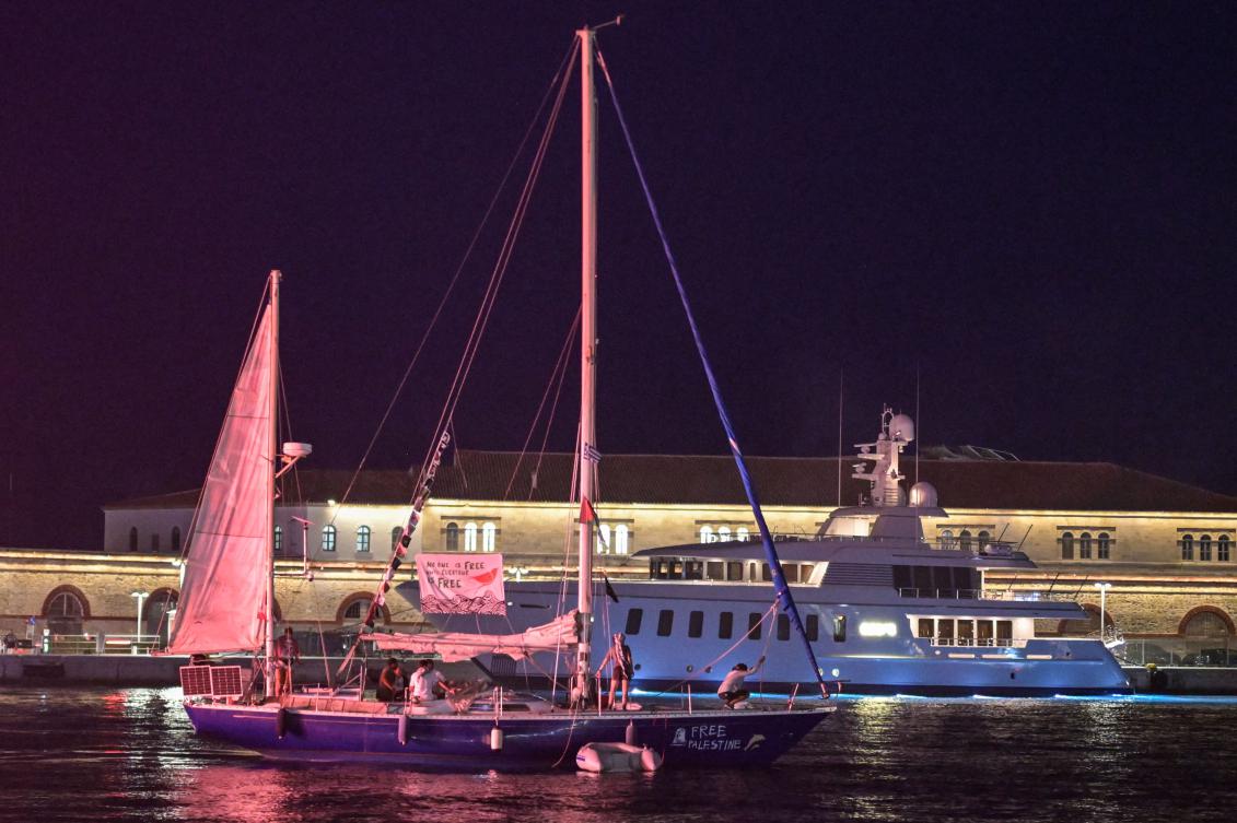A vessel departs from the port of Syros Island in Greece, forming the Oxygen delegation to join the Global Sumud Flotilla, Sept. 14, 2025. (AFP)