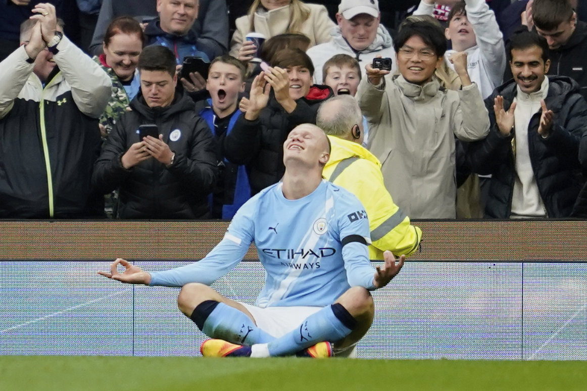 Manchester City's Erling Haaland celebrates after scoring during the Premier League soccer match between Manchester City and Manchester United in Manchester, England, Sunday, Sept. 14, 2025. (AP)