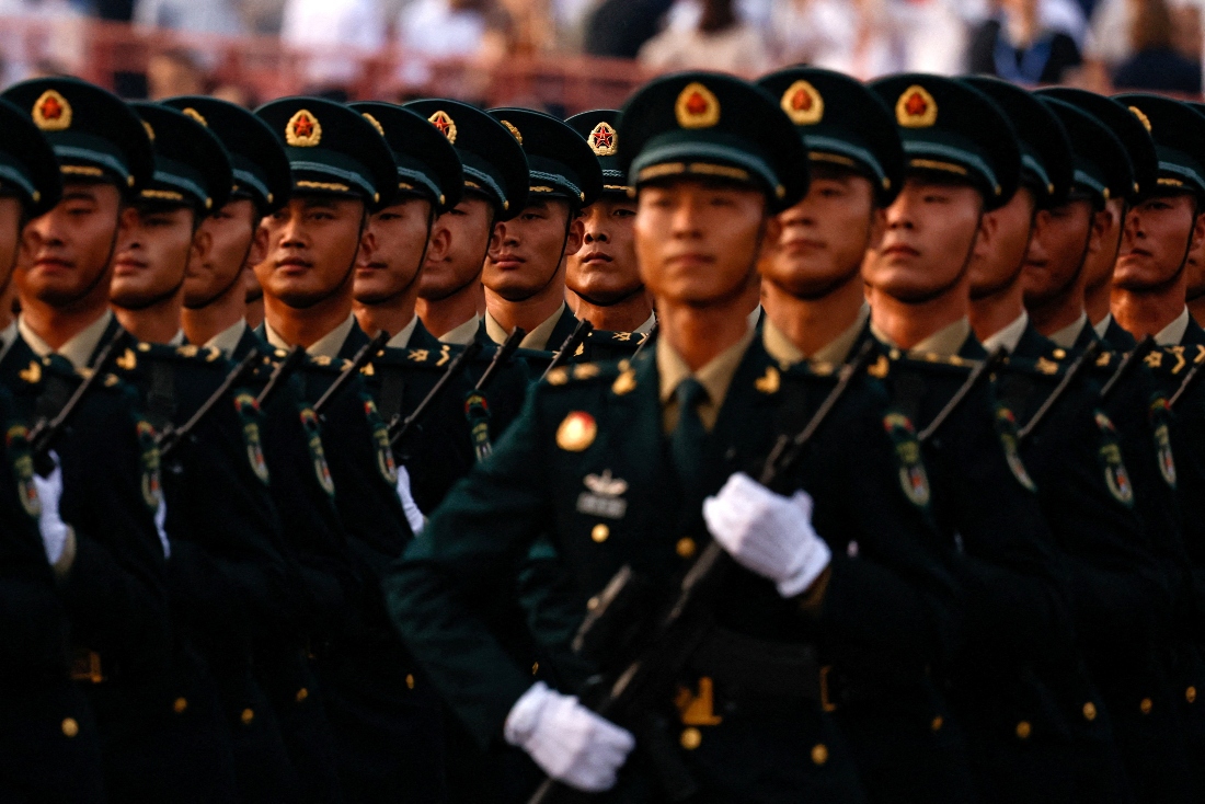 Chinese Rocket Force personnel march during the rehearsal ahead of a military parade to mark the 80th anniversary of the end of World War Two, in Beijing, China. (Reuters)