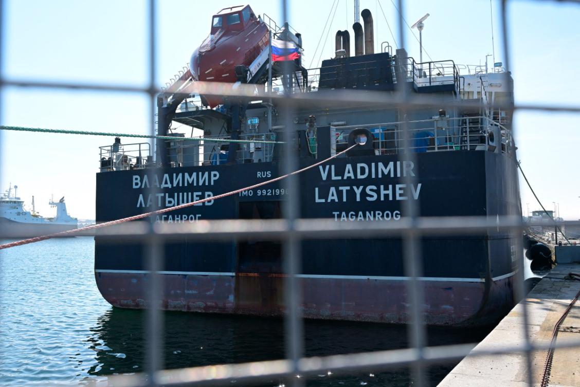 This photograph taken on April 11, 2025 shows the "Vladimir Latyshev" Russian cargo ship which has been immobilized and blocked in Saint-Malo harbour, western France, with its crew confined aboard, since March 1, 2022, as part of the Russian asset freeze. (AFP)