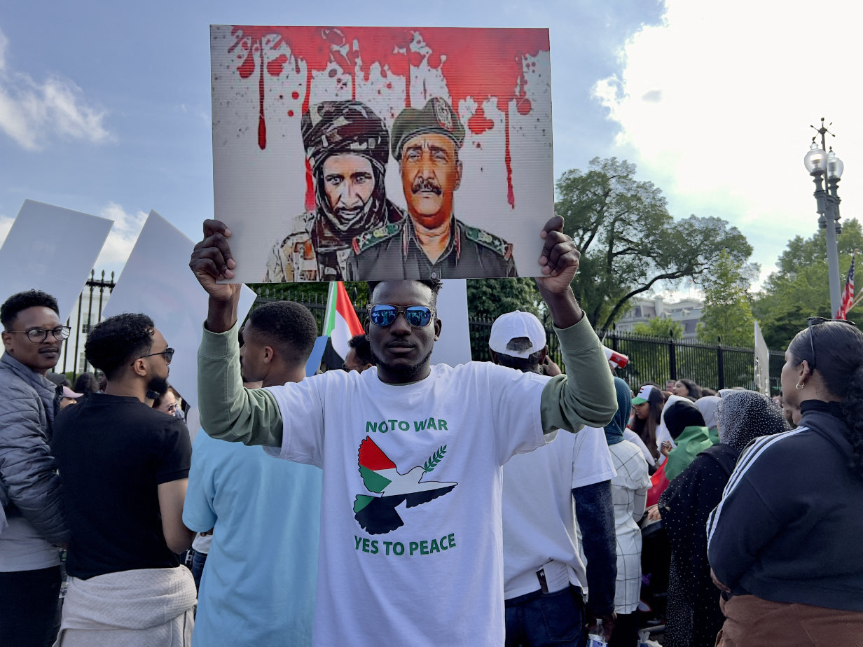 Activists demonstrate in front of the White House, calling on the US to intervene to stop the fighting in Sudan, in Washington, DC. (AFP/File)
