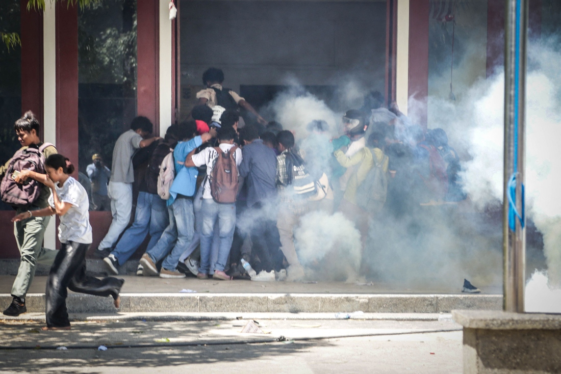 East Timor police clash with protesters over plan to buy vehicles for MPs