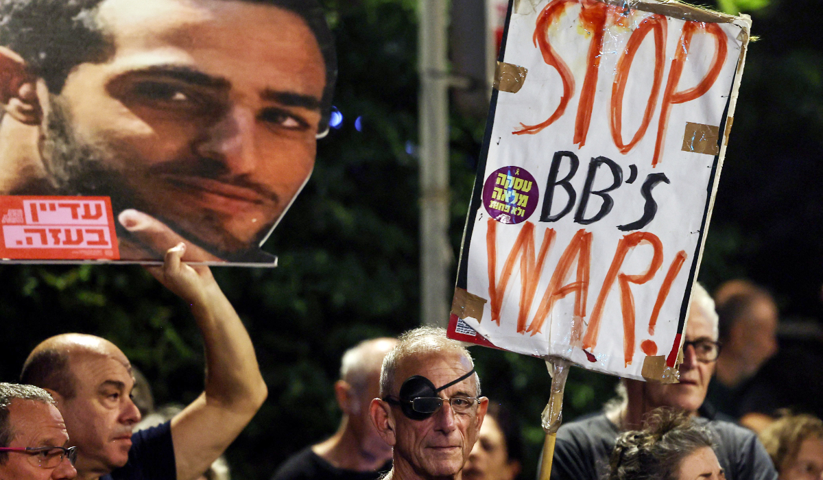 Relatives of Israeli hostages and demonstrators take part in an anti-government protest calling for action to secure the release of Israeli hostages held by Palestinian militants in the Gaza Strip since October 7, 2023, in front of the prime minister's residence in Jerusalem, on September 16, 2025. (AFP)