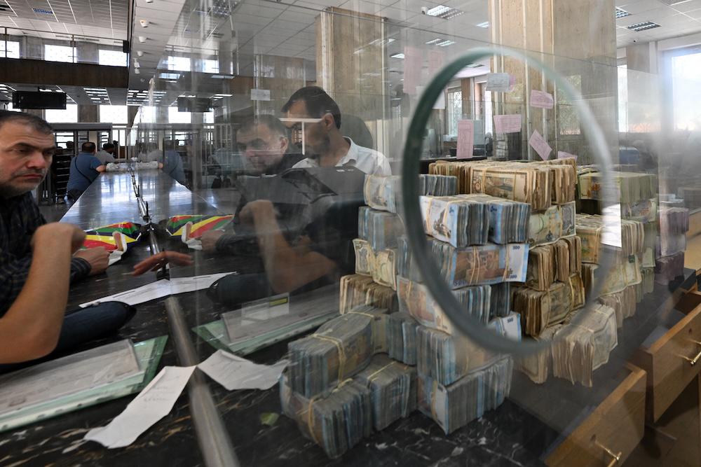 Syria has requested bids from international suppliers to print new currency notes as part of its efforts to boost the devalued pound. (AFP)