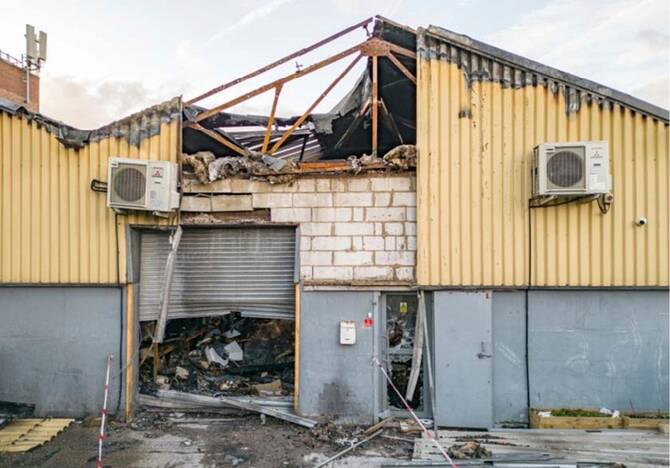 Undated handout by the Metropolitan police shows damage to a warehouse in east London which was storing goods for Ukraine. (Handout)