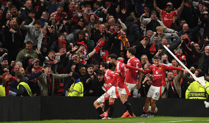 Manchester United posted record revenues in their latest annual accounts despite missing out on Champions League soccer and enduring their its worst-ever Premier League campaign. (AFP/File)
