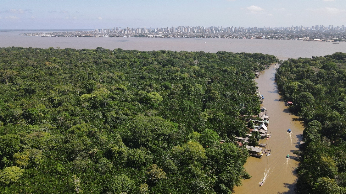 Drone image shows the Amazon rainforest and the city of Belem in the back ahead of COP 30, at Ilha do Combu, in Belem, Brazil. (Reuters)