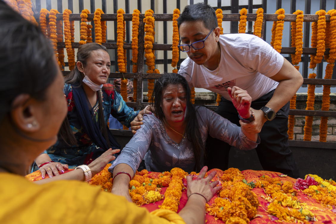 The mother of Rashik Khadiwoda, who was killed during the Gen-Z protest, breaks down in tears while paying her last respects in Katmandu, Nepal on Sept. 16, 2025. (EPA)